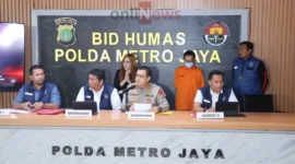 Kasubdit 2 Ditreskrimsus Polda Metro Jaya, AKBP Herman Edco Simbolon saat memberikan keterangan kepada wartawan di Mapolda Metro Jaya.