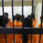 Petugas Imigrasi mengamankan warga negara asing dalam razia keimigrasian di Penjaringan, Jakarta Utara. Dok; Istimewa