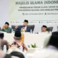 Ketua MUI Bidang Fatwa Prof Asrorun Niam Sholeh menyampaikan Fatwa Pajak Berkeadilan dalam Munas MUI XI 2025. (Posnews/Ist)