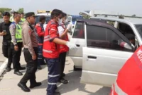 Mobil Toyota Kijang Kapsul lokasi penemuan empat jenazah di Tol Pejagan–Pemalang Km 284 Kabupaten Tegal. (Posnews/Humas Polres Tegal)