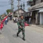 Prajurit TNI AD membubarkan konvoi pembawa bendera GAM di jalan nasional Banda Aceh–Medan, Lhokseumawe, Aceh, dan mengamankan senjata api serta rencong. (Posnews/TNI)