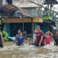 Ilustrasi, warga terdampak banjir setinggi hingga 120 sentimeter di Kecamatan Cipondoh, Kota Tangerang, Jumat (23/1/2026). (Posnews/Ist)

