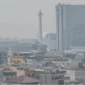 Pemandangan kota Jakarta pagi hari dengan kabut polusi. (Posnews/greenpeace.org)