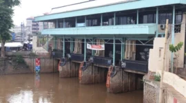 Pintu Air Pasar Ikan Jakarta Utara Siaga 2, ketinggian air meningkat. (Dok: Posnews/Ist)