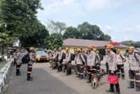 Tim Den K9 SAR Polri melakukan pencarian korban longsor di Desa Pasirlangu, Kabupaten Bandung Barat, Jawa Barat. (Posnews/Ist)