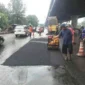 Hujan Belum Reda, Jalan Jakarta Kembali Berlubang Meski Ditambal Ribuan Titik. Posnews/Kominfo)