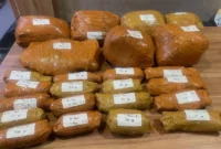 Polisi menyita 9,4 kg ganja dari mobil tersangka di parkiran RS UKI. (Posnews/Ist)