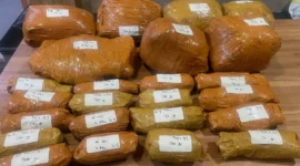Polisi menyita 9,4 kg ganja dari mobil tersangka di parkiran RS UKI. (Posnews/Ist)