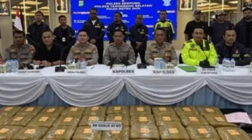 Ilustrasi, paket ganja dibungkus lakban cokelat diamankan polisi. (Posnews/Net)