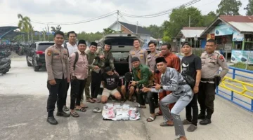 Polisi Polres Bengkalis menunjukkan barang bukti 13 kilogram sabu dan ratusan etomidate hasil pengungkapan kasus narkoba di Pelabuhan Roro Air Putih, 22 Maret 2026. (Posnews/Ist)