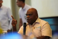 Menteri HAM Natalius Pigai memberikan pernyataan terkait kebebasan berpendapat. (Posnews/Ist)