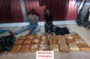 Polisi menunjukkan barang bukti 24 paket ganja seberat 23 kilogram hasil pengungkapan kasus narkoba di Rokan Hulu Riau. (Posnews/Ist)