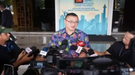 Anggota DPRD DKI Jakarta Hardiyanto Kenneth menghadiri pertemuan Forkopimko terkait keamanan Jakarta Barat. (Posnews/ist)
