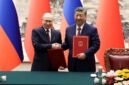 Penyelarasan kekuatan baru. Presiden Vladimir Putin dan Presiden Xi Jinping bertemu di Beijing untuk mengecam rencana perisai rudal 