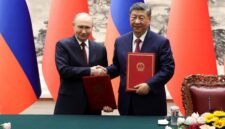 Penyelarasan kekuatan baru. Presiden Vladimir Putin dan Presiden Xi Jinping bertemu di Beijing untuk mengecam rencana perisai rudal 