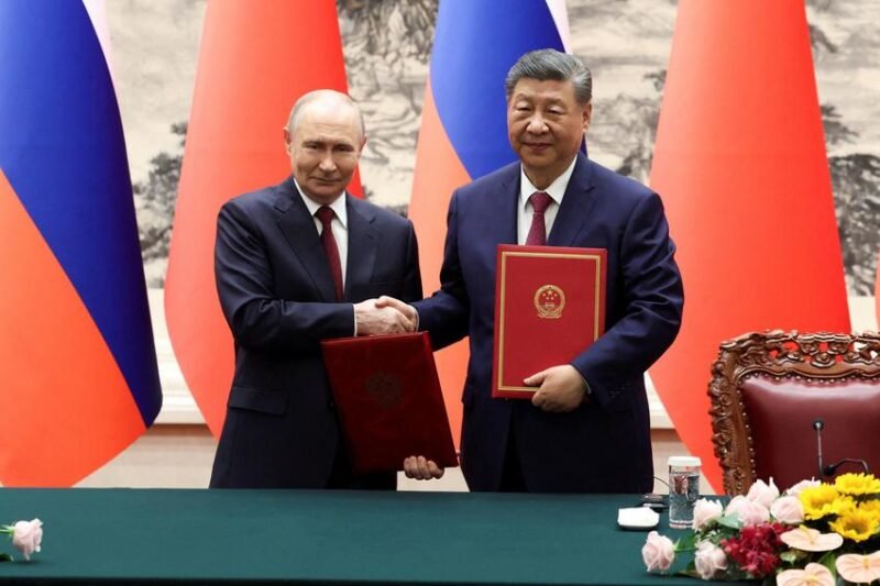 Penyelarasan kekuatan baru. Presiden Vladimir Putin dan Presiden Xi Jinping bertemu di Beijing untuk mengecam rencana perisai rudal 