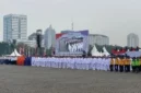 Gubernur DKI Jakarta Pramono Anung memimpin upacara HUT ke-499 Jakarta di Monumen Nasional (Monas) dengan latar defile OPD dan pertunjukan budaya Betawi. (Posnews/Ist)
