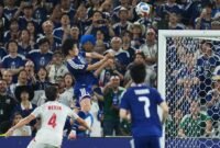 Dominasi mutlak Samurai Blue. Jepang mencetak sejarah baru setelah menggilas Tunisia empat-nol, membuka peluang lebar menuju babak gugur Piala Dunia. Dok: (AP Photo/Matias Delacroix)