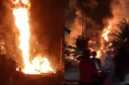 Petugas pemadam kebakaran berupaya memadamkan kobaran api akibat ledakan sumur minyak tradisional di Gampong Lhok Lemak, Kabupaten Aceh Timur, Minggu (5/7/2026). (Posnews/Tangkapan layar video)