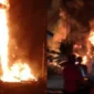 Petugas pemadam kebakaran berupaya memadamkan kobaran api akibat ledakan sumur minyak tradisional di Gampong Lhok Lemak, Kabupaten Aceh Timur, Minggu (5/7/2026). (Posnews/Tangkapan layar video)