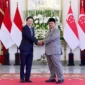 Presiden Prabowo Subianto dan Perdana Menteri Singapura Lawrence Wong menghadiri Leaders' Retreat Indonesia-Singapura di Istana Merdeka, Jakarta, dengan agenda penandatanganan 26 MoU strategis. (Posnews/Dewan Pertahanan Nasional RI)