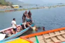 Polisi melakukan olah TKP di kawasan Waduk Jatiluhur, Purwakarta, terkait penemuan satpam tewas dengan kondisi tangan terborgol. (Posnews/Polres Purwakarta)