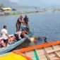 Polisi melakukan olah TKP di kawasan Waduk Jatiluhur, Purwakarta, terkait penemuan satpam tewas dengan kondisi tangan terborgol. (Posnews/Polres Purwakarta)