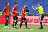 Tragedi menit akhir skuad Firaun. Argentina menundukkan Mesir 3-2 secara dramatis di tengah hujan kartu kuning dan protes keras pelatih Hossam Hassan terhadap kepemimpinan wasit. Dok: (AP Photo/Erik S. Lesser)