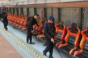 Personel Brimob Polda Metro Jaya melakukan sterilisasi Jakarta International Stadium jelang laga Persija vs Brisbane Roar. (Posnews/Humas PMJ)