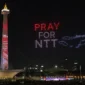 Pertunjukan Malam Merdeka HUT ke-81 RI di kawasan Monas dan Bundaran HI Jakarta dengan pesan Pray for NTT.
