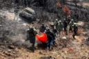 Jenazah Aris Sanda dievakuasi dari kawasan Danau Habema menuju Wamena. (Posnews/Humas Satgas ODC)
