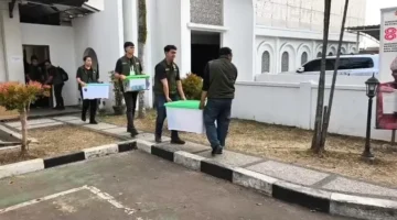 Penyidik Polda Metro Jaya menggeledah Kantor BPN Kabupaten Bogor terkait dugaan mafia tanah PTSL 2019. (Posnews/Ist)
