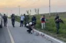 Polisi melakukan olah TKP penembakan tiga pegawai Dinas Pertanian Jayawijaya di Muliama. (Posnews/Ist)

