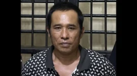 Polisi mengamankan Adi Susanto terkait penembakan di lapak sabung ayam Mesuji. (Posnews/Ist)

