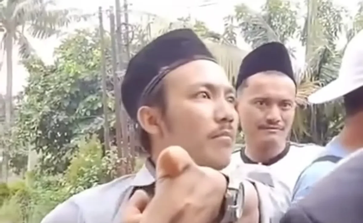  Aji Cahyono Putra, tersangka kasus dugaan gangguan ibadah jemaat GKPI di Rajeg, Kabupaten Tangerang.
