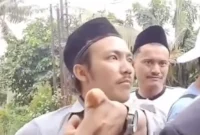  Aji Cahyono Putra, tersangka kasus dugaan gangguan ibadah jemaat GKPI di Rajeg, Kabupaten Tangerang.
