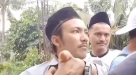  Aji Cahyono Putra, tersangka kasus dugaan gangguan ibadah jemaat GKPI di Rajeg, Kabupaten Tangerang.
