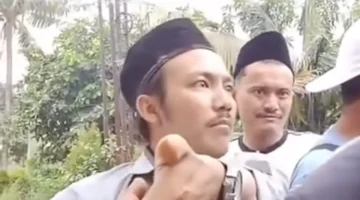  Aji Cahyono Putra, tersangka kasus dugaan gangguan ibadah jemaat GKPI di Rajeg, Kabupaten Tangerang.
