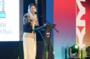 Wamendag Dyah Roro Esti Widya Putri menyampaikan peluang talenta musik Indonesia menembus pasar global dalam Konferensi Musik Indonesia 2026 di Makassar. (Posnews/Kemendag)
